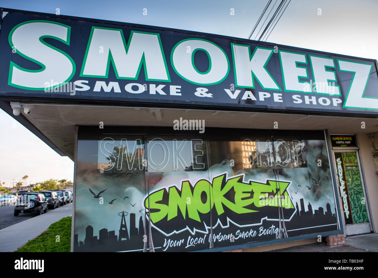 convenience store exterior problem icon, local shop restricted vape selection, tobacconist sign with limited stock - Smokeez Smoke and Vape shop exterior sign and logo on a street in ...