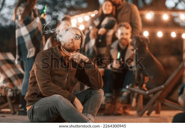 People vaping at Southbank rooftop bar, Australian lifestyle with modern vapes, friends enjoying disposable vapes outdoor - 1+ Thousand Friends Vaping Royalty-Free Images, Stock Photos ...