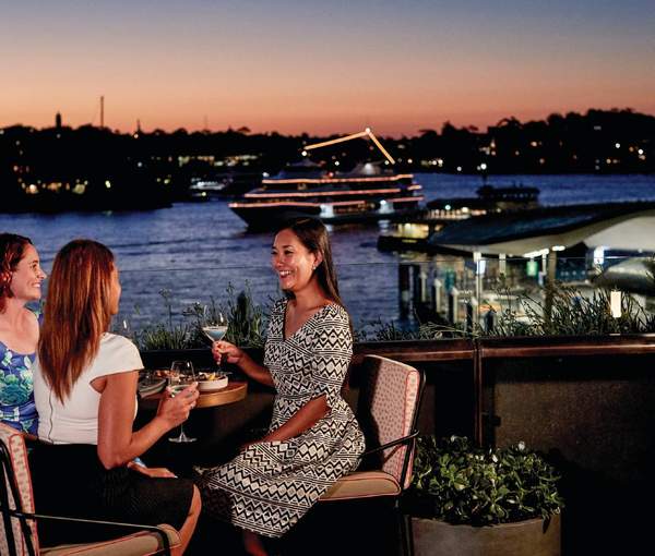 person vaping beachside cafe sunset Australia, enjoying vape rooftop bar Sydney evening - Six Places to Watch the Sunset in Sydney with a Cocktail in Hand ...