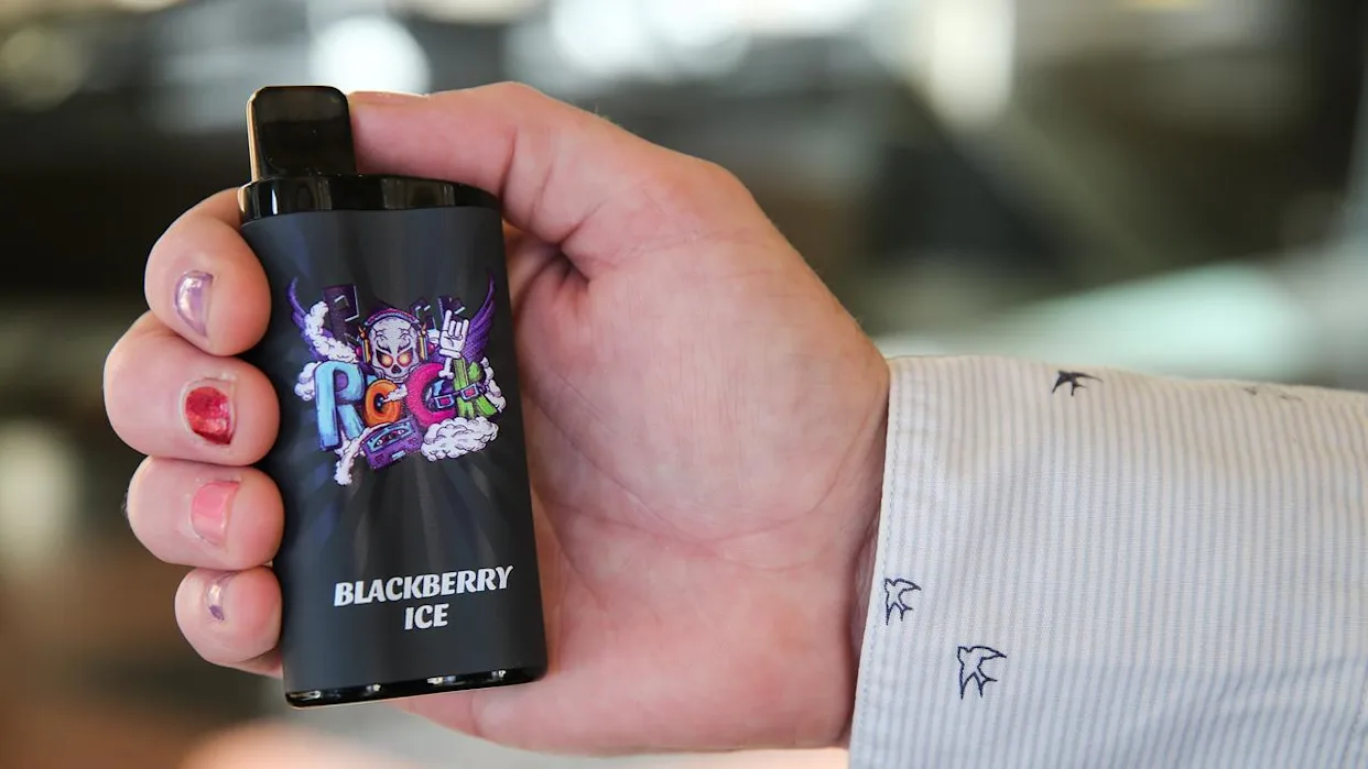 Scorching Perth afternoon vape, hot Australian street heat haze, person craving ice cold vape summer - <img src=