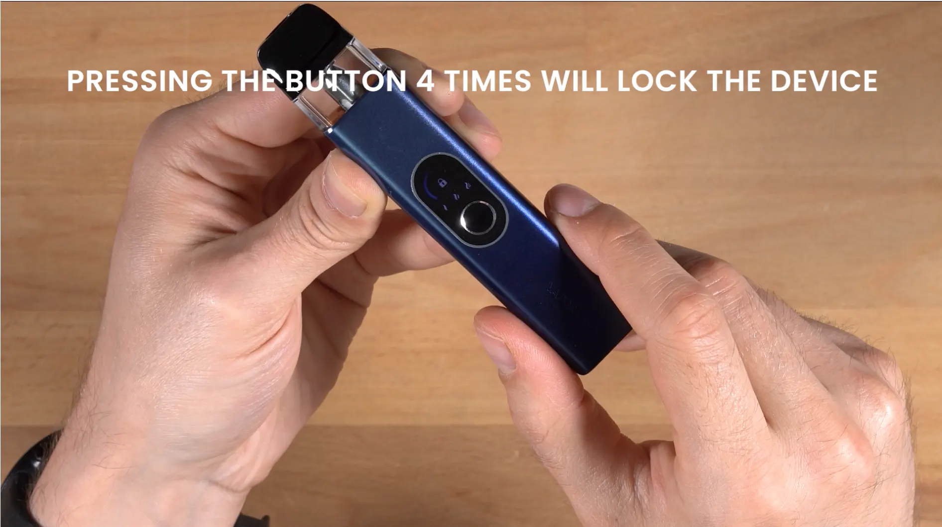 Hand pressing button on vape device, finger on vape fire button, manual vape control - How to Set Up and Use the Vaporesso XROS 4 | Easy Setup Guide