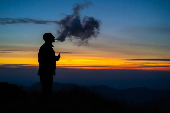 person vaping in Blue Mountains, disposable vape outdoor Australia, coastal hike vaping, scenic travel vape - 9 Ways To Trash Your Vape In The Great Outdoors - And How Not To ...