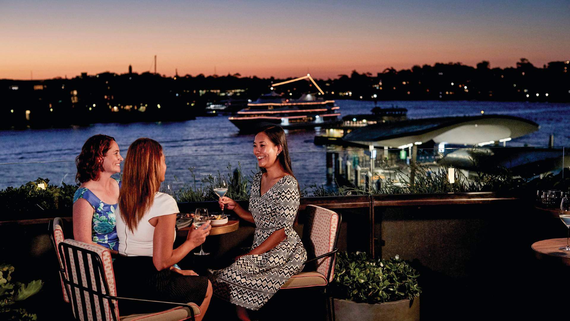Australian rooftop bar sunset, fashionable people socializing, subtle vape in hand, Sydney social scene - Six Places to Watch the Sunset in Sydney with a Cocktail in ...